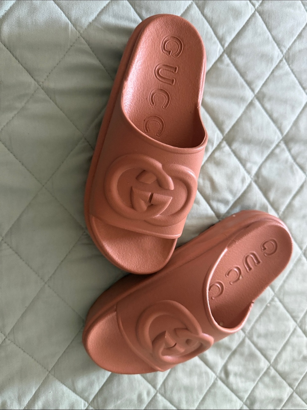 Gucci Coral-Peach Embossed GG Slide Sandals
